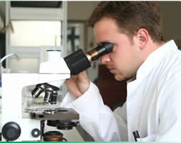 Image of a lab technician at work